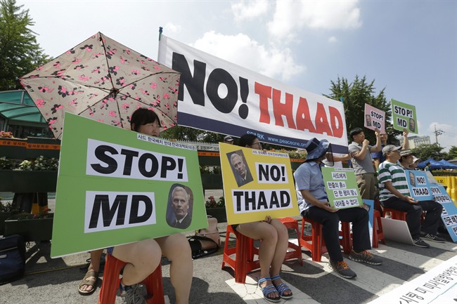 South Korean protesters stage a rally opposing a plan to deploy an advanced U.S. missile defense system in the country called Terminal High-Altitude Area Defense, or THAAD, in front of the Defense Ministry in Seoul, South Korea, Thursday, Aug. 11, 2016. James Syring, director of the U.S. Missile Defense Agency, arrived on Thursday to meet with South Korean officials on the deployment of THAAD. The need for and safety of THAAD are still being debated in South Korea after the government decided in early July to install it as a defensive measure against threats from North Korea.