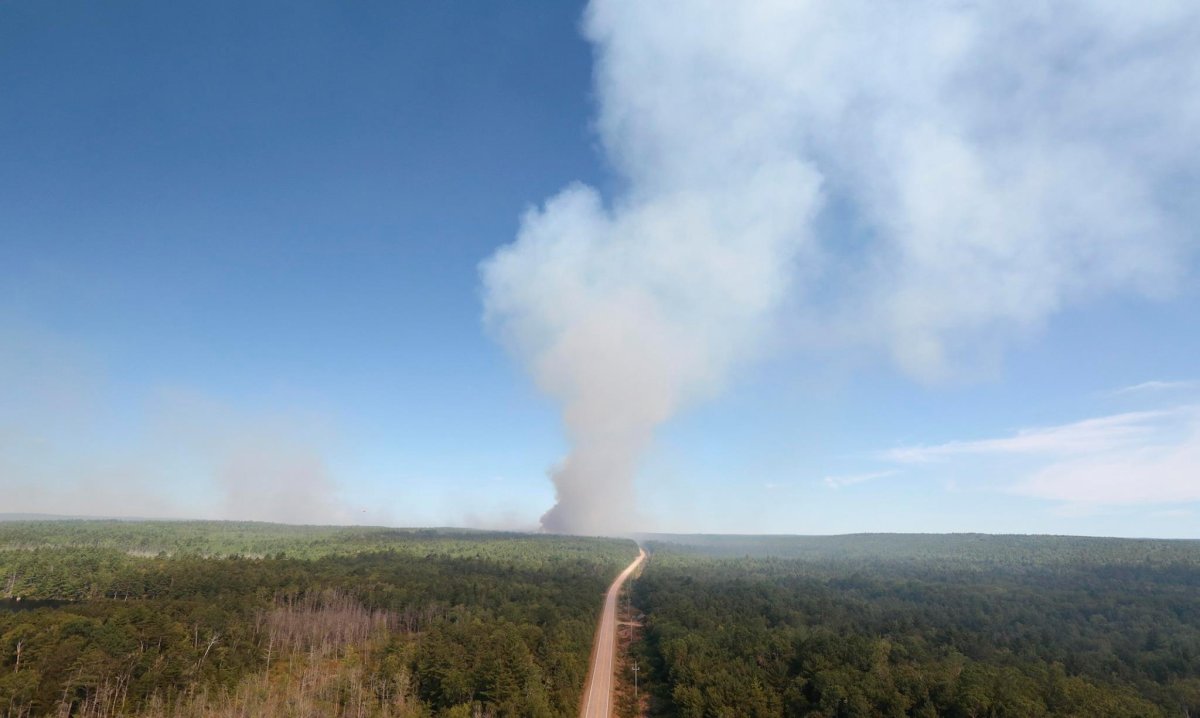 A stubborn fire is growing near Seven Mile Lake in Nova Scotia, prompting the government to impose a travel ban on the province's trails and parks. 