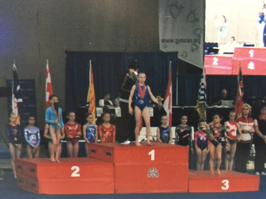 Shallon Olsen with a second place finish at Junior Nationals at the age of 9
