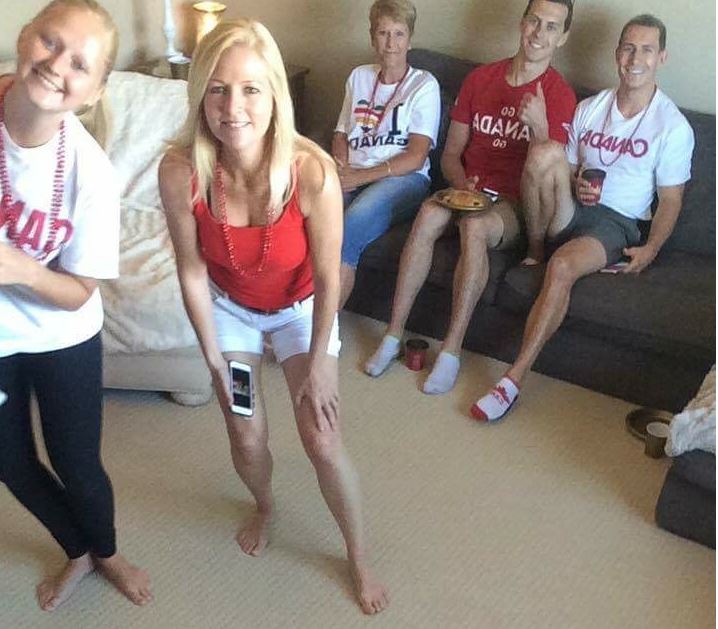 Linda Olsen and family host a viewing party to cheer on her niece Shallon, during the vault final at the Rio Olympics.