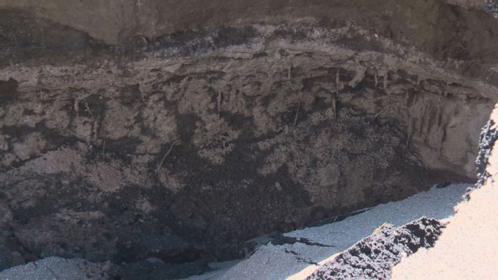 A large sinkhole opened up at 40 Avenue and 112A Street in south Edmonton on Aug. 4, 2016.