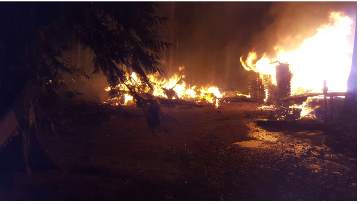 The fire on Thursday night completely gutted the home and some of the nearby forest. 