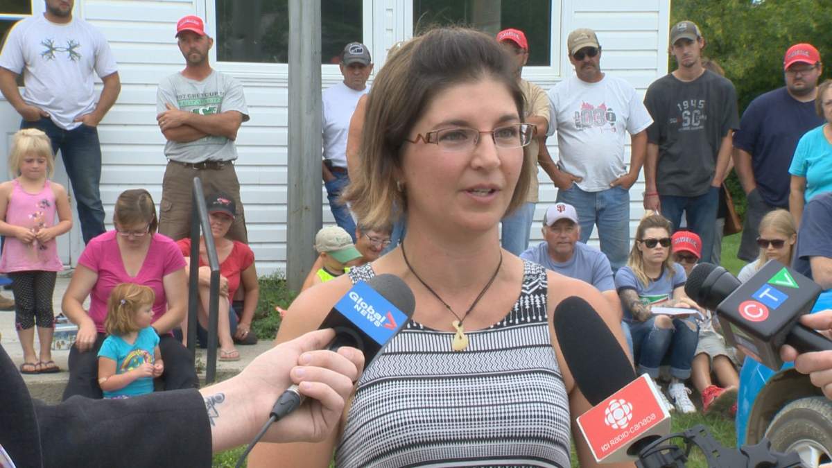 Thera Nordal, and Havelock Special Project Committee supporters, share their disappointment with reporters outside the RM of Longlaketon office in Earl Grey, Sask.