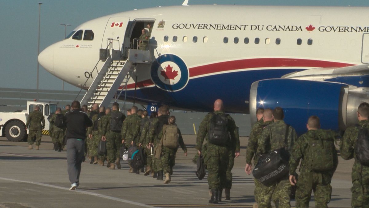 Soldiers leave Edmonton for Ukraine, Aug. 4, 2016.