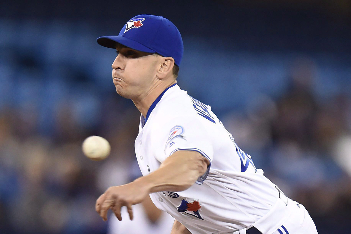 Toronto Blue Jays relief pitcher Pat Venditte pitches left handed during eighth inning American League baseball action against the Chicago White Sox in Toronto on Monday, April 25, 2016. 