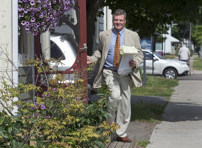 Owen Parkhouse, from Morel, P.E.I., campaigns door to door in his bid to become a senator from the Island, in Charlottetown on Tuesday, Aug. 2, 2016. 