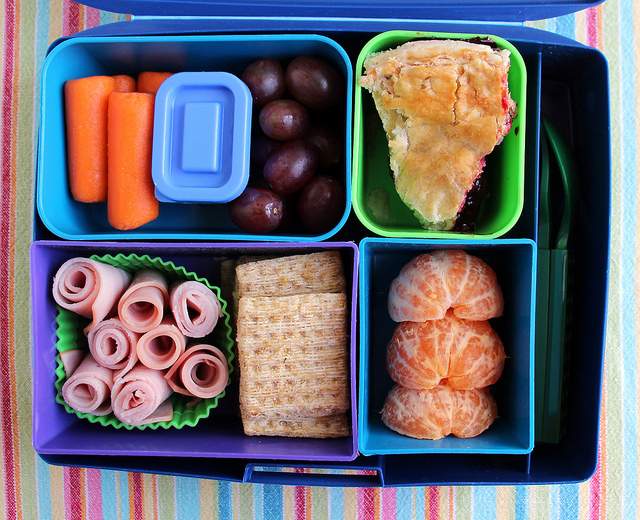 A few crackers, processed meat, sliced cheese, and a candy bar. Your kids love Lunchables but at nearly $4 a pop, are you better off making a cheaper and healthier alternative at home?.