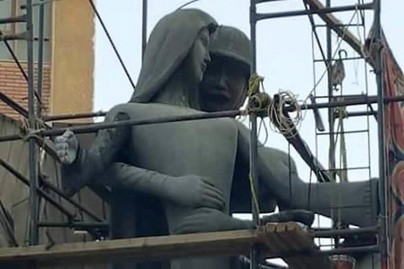 A sculpture, titled "Mother of the Martyr,"depicts a slender peasant woman, a traditional artistic representation of Egypt, with her arms outstretched with a helmeted soldier standing behind her, at a public square in Sohag, Egypt. A provincial governor in Egypt has ordered changes to a sculpture honoring fallen soldiers after many on social media said it appeared to depict an unwanted advance on a woman symbolizing the country. 
