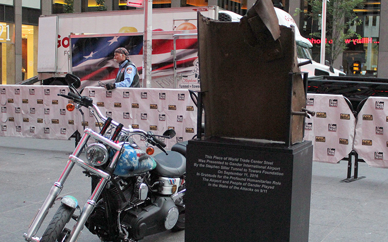 A motorcycle sits next to a piece of steel beam from the south tower from the World Trade Center towers in New York on Tuesday Sept. 6, 2016. THE CANADIAN PRESS/HO-Stephen Siller Tunnel to Towers Foundation.