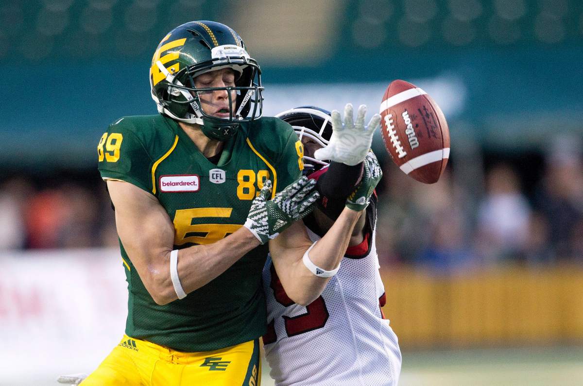 Calgary Stampeders Jamar Wall (29) blocks the catch on Edmonton Eskimos Chris Getzlaf (89) during second half CFL action in Edmonton, Alta., on Saturday September 10, 2016. THE CANADIAN PRESS/Jason Franson.