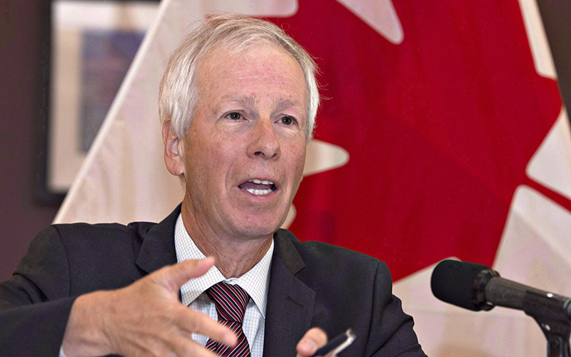 Foreign Affairs Minister Stephane Dion responds to reporters questions at a news conference at CFB Bagotville in Saguenay, Que. on Friday, August 26, 2016. 