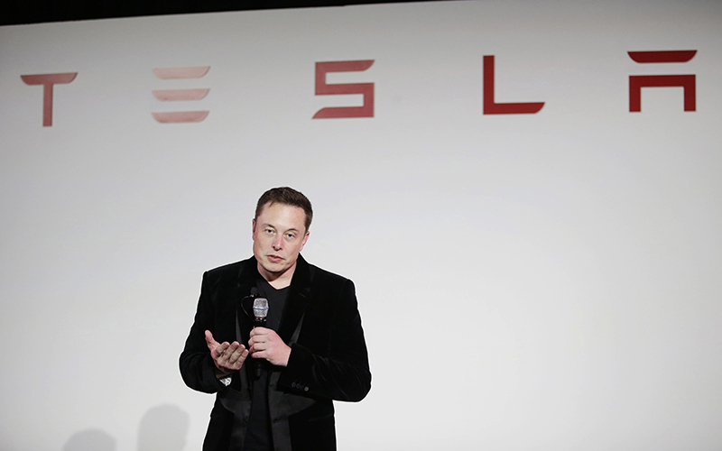 Elon Musk, CEO of Tesla Motors Inc., talks during a news conference at the company's headquarters in Fremont, Calif. 