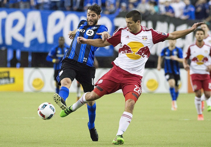 Montreal Impact's Ignacio Piatti (10) challenges New York Red Bulls' Karl Ouimette during first half MLS soccer action in Montreal Saturday, March 12, 2016. The Montreal Impact's season is winding down and captain Patrice Bernier knows his side needs to turn the tide if it hopes to remain in the playoff race. Montreal (9-9-11) has won just once in its last seven MLS games as it clings to the fifth spot in the Eastern Conference. 