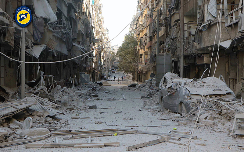 In this photo provided by the Syrian Civil Defense group known as the White Helmets, shows heavily damaged buildings after airstrikes hit in Aleppo, Syria, Saturday, Sept. 24, 2016. 