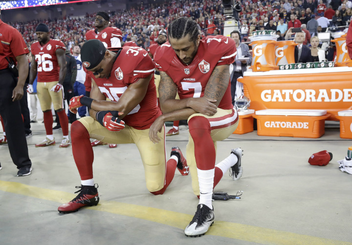 San Francisco 49ers quarterback Colin Kaepernick (7) kneeling during the national anthem before an NFL football game Sept. 12, 2016, will start in this week's game against the Buffalo Bills.