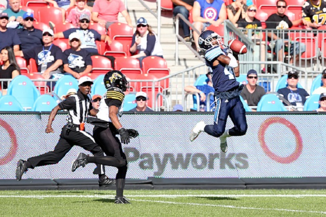 T.J Heath (#46) intercepts a ball against the Hamilton Tiger-Cats  during a pre-season game at BMO Field.