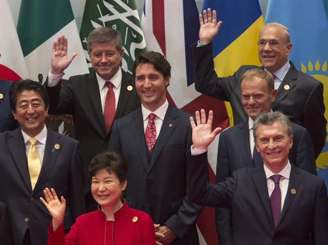Justin Trudeau poses with other leaders during the family photo at the G20 Leaders Summit in Hangzhou, Sunday, Sept. 4, 2016.