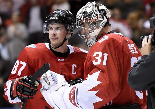 Canada's Sidney Crosby (87) and goalie Carey Price (31) look on before the end of third period World Cup of Hockey action against the Czech Republic, in Toronto on Saturday, September 17, 2016. Canada swept the Czechs 6-0.