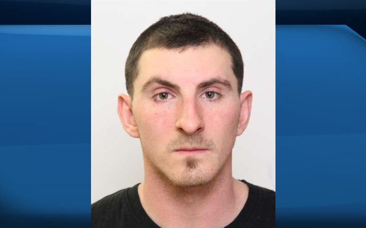 The Edmonton Police Service Homicide Section has issued a Canada-wide warrant for the arrest of Austin Mackenzie Southworth, 26, in connection with the homicide of Brad MacDonald, 37, earlier in 2016. This photo of Southworth was taken before he got his neck tattoos.