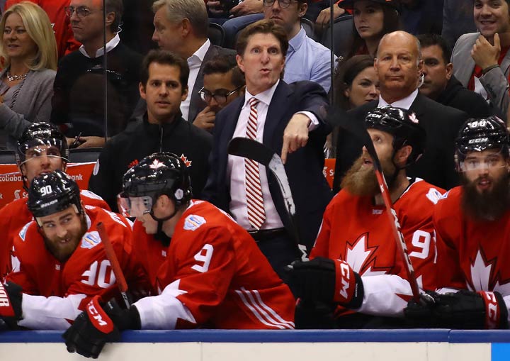 Head coach Mike Babcock of Team Canada instructs his team against Team Russia during the third period at the semifinal game during the World Cup of Hockey tournament at Air Canada Centre on September 24, 2016 in Toronto, Canada. Team Canada defeated Team Russia 5-2.