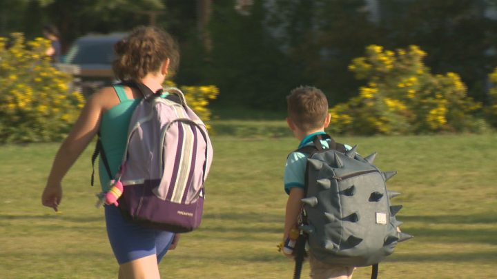 Students head into class at Grant Road School in Regina on Sept. 1. 