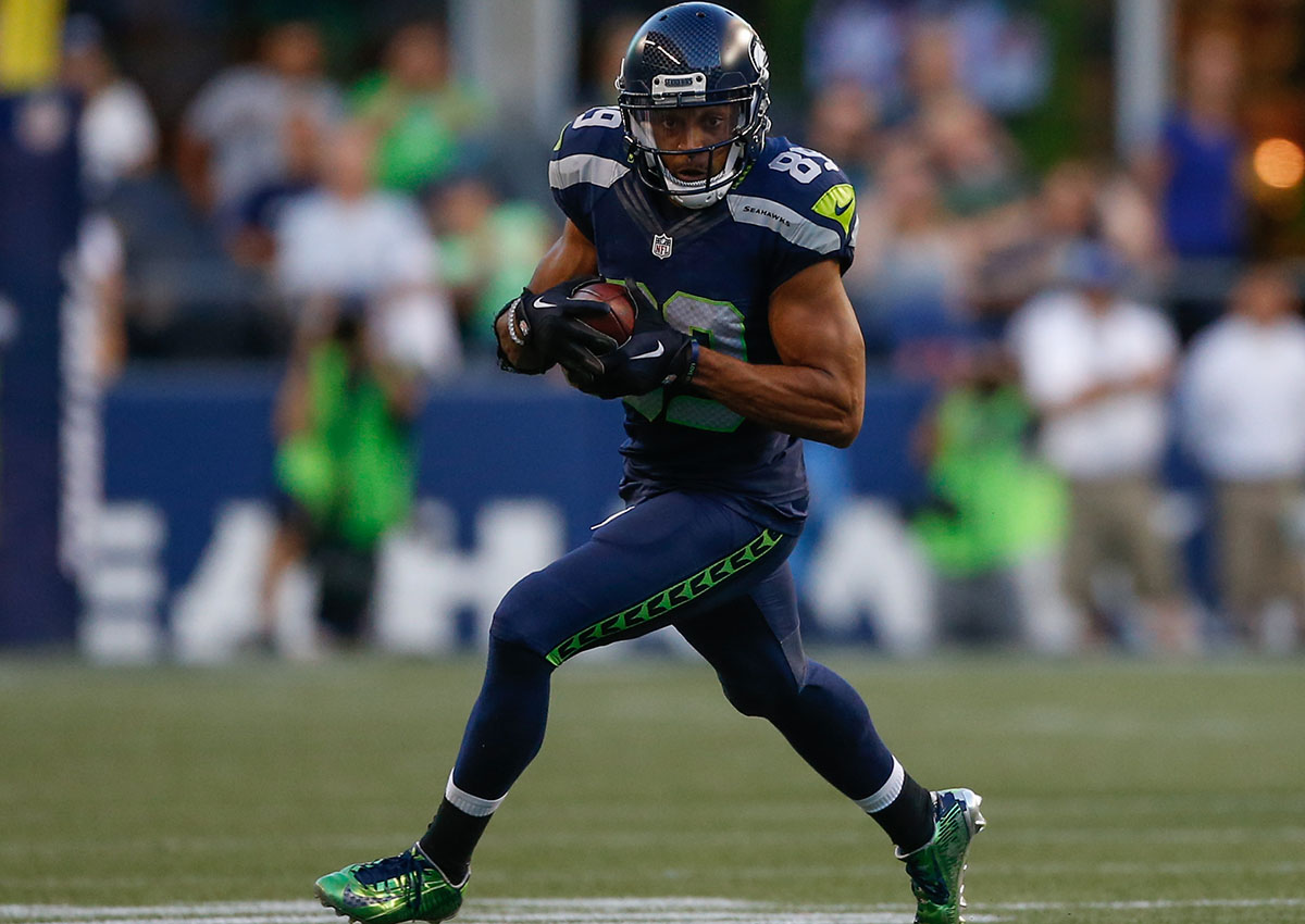 Wide receiver Doug Baldwin of the Seattle Seahawks rushes against the Dallas Cowboys during the preseason game at CenturyLink Field on August 25, 2016 in Seattle, Washington.
