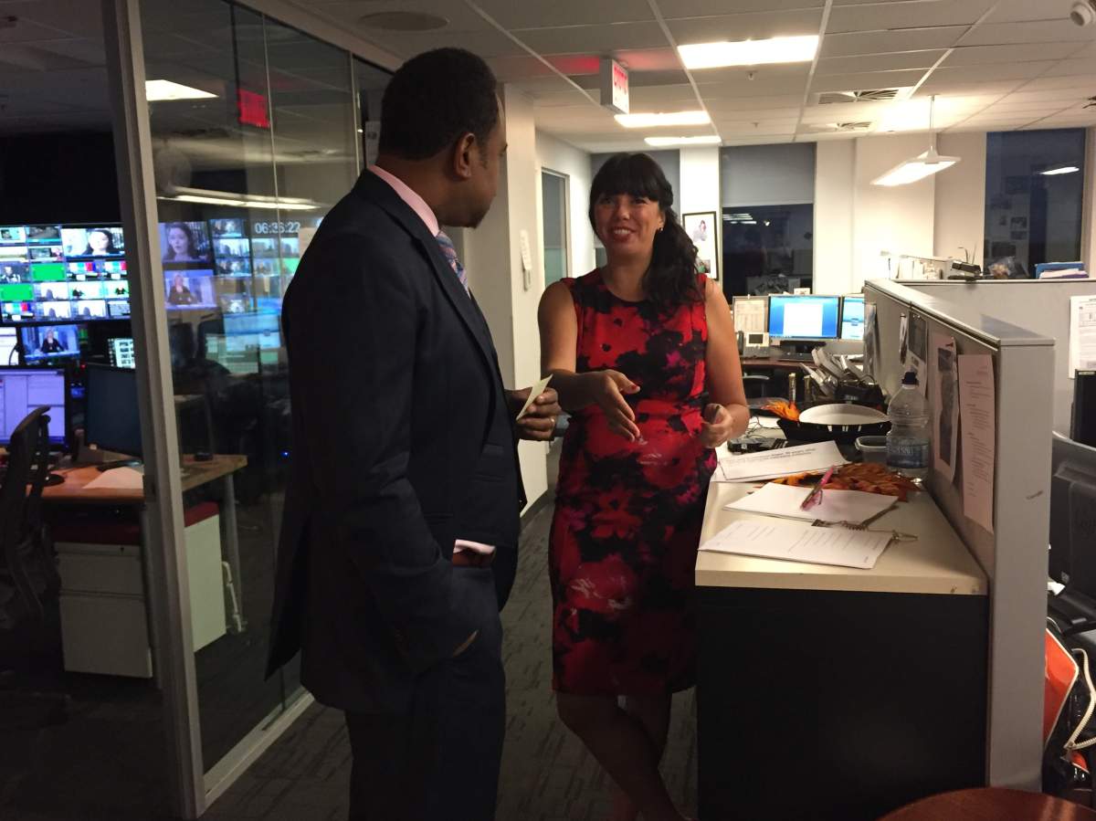 Benz Antoine prepares for hosting duties with weather specialist Kim Sullivan, Friday, September 30, 2016.