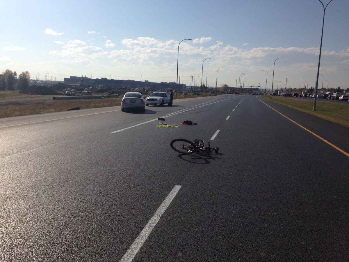 A man in his late 20s or early 30s was seriously hurt after being struck by a vehicle while riding his bicycle in southeast Calgary.