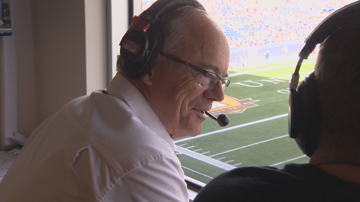Bob Irving in the broadcast booth at IG Field .