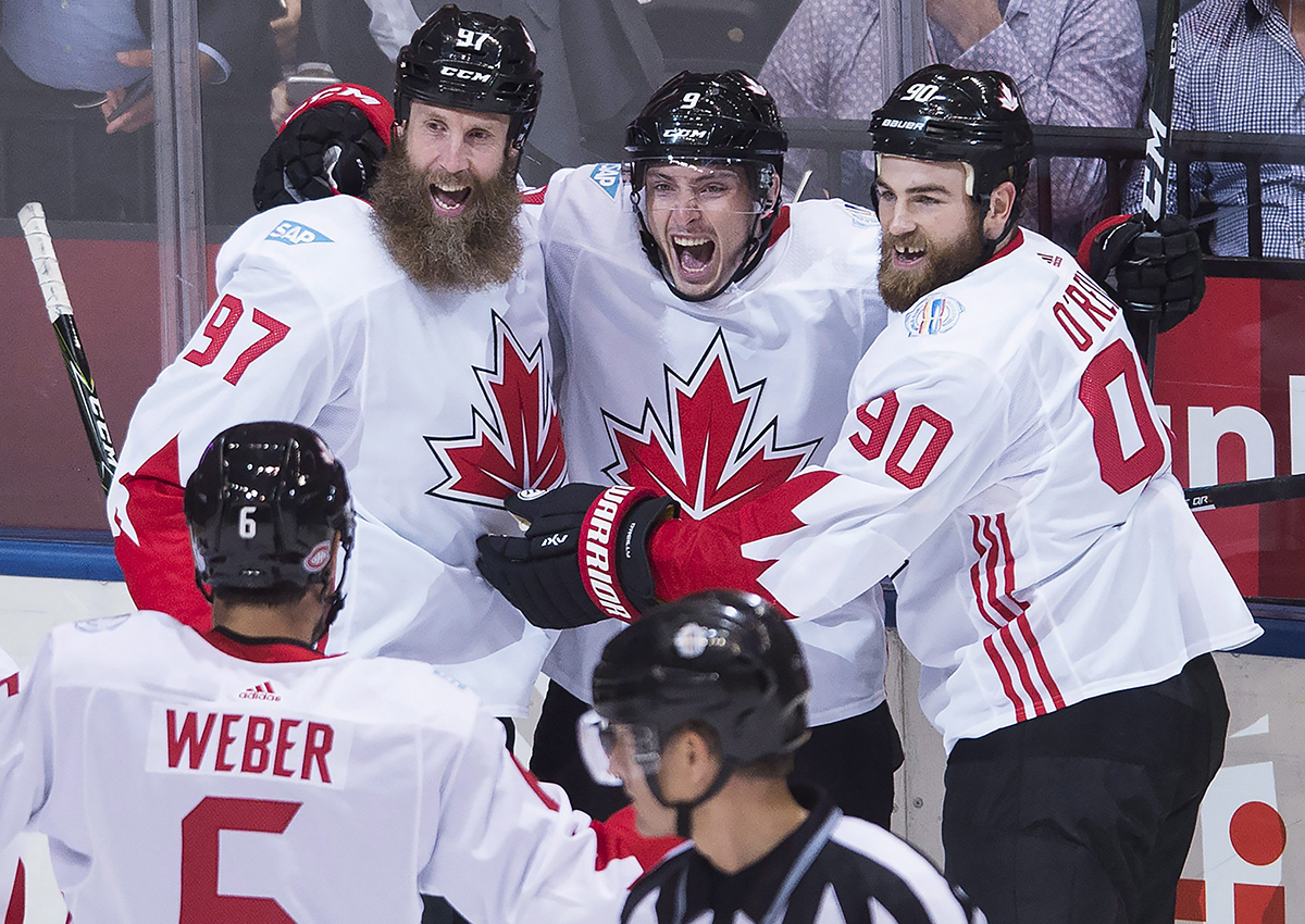 Team Canada centre Matt Duchene, centre, (9) celebrates his goal with teammates Joe Thornton (97) Ryan O'Reilly (90) and Shea Weber (6) while playing against team USA during first period World Cup of Hockey action in Toronto on Tuesday, September 20, 2016. 