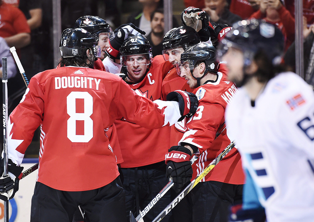 Team Canada's Patrice Bergeron (37) celebrates his goal against Team Europe with teammates Brad Marchand (63), Sidney Crosby (87), Drew Doughty (8) and Jay Bouwmeester (4) as Europe's Mats Zuccarello (63) skates by during third period World Cup of Hockey finals action in Toronto on Tuesday, September 27, 2016.
