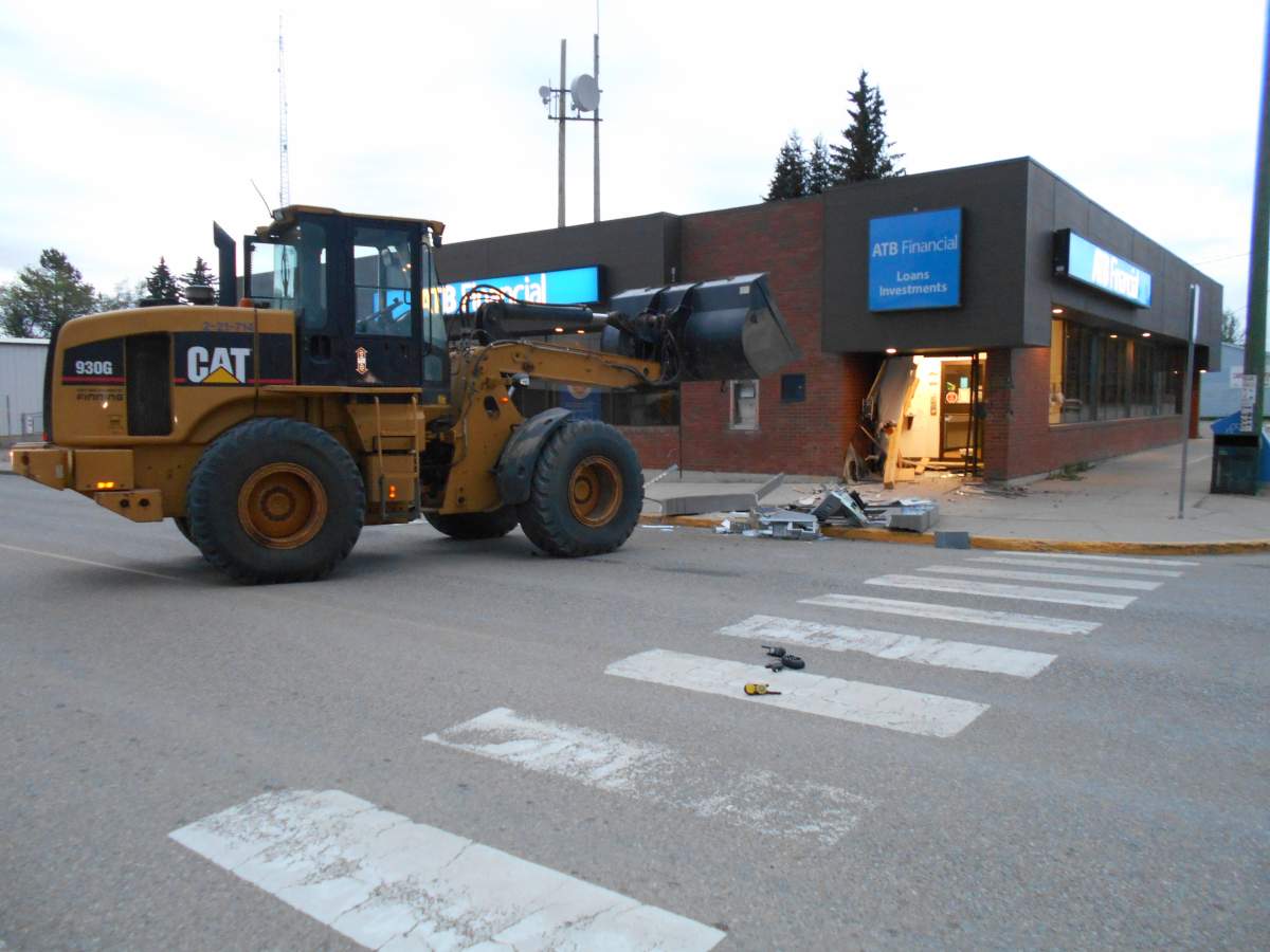 On Thursday, May 5, 2016, a CAT 930G wheel loader was used to break through the wall of the ATB Financial in Caroline, Alta. and steal the ATM.