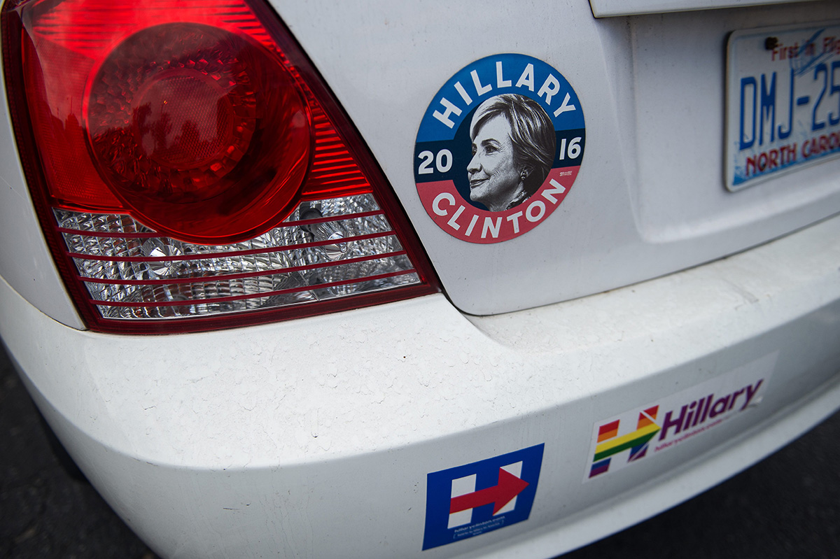 Bumper stickers are seen on a car outside a campaign office of US Democratic presidential candidate Hillary Clinton in Charlotte, North Carolina, on September 19, 2016.