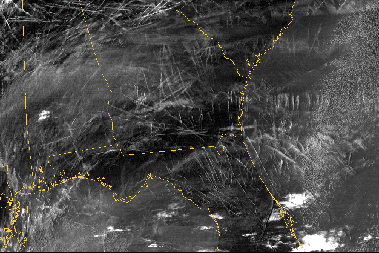 The southeast of the United States is crisscrossed with jet contrails in this image from NASA.  