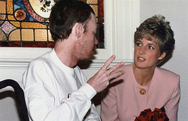 Diana, Princess of Wales, chats with AIDS patient Wayne Taylor at Casey House AIDS hospice in Toronto in this Oct. 26, 1991 photo. It's been almost 30 years since Diana, Princess of Wales, kissed an AIDS patient on the cheek.Her open-hearted, selfless gesture of compassion at London's Mildmay Hospital in 1989 was noticed around the world and helped reduce the vast belief that AIDS could be transferred by human touch.