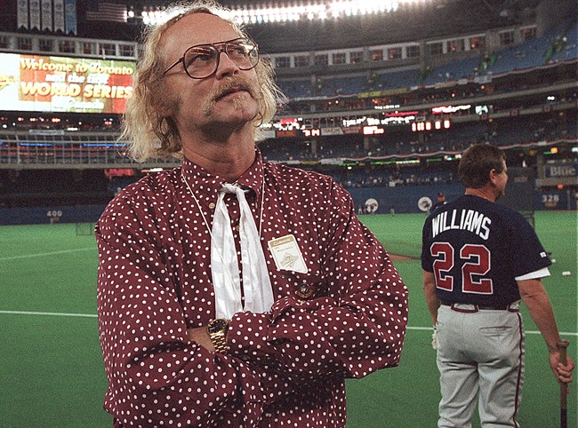 Canadian author W.P. Kinsella stands on the baseball field before game five of the World Series between Toronto Blue Jays and Atlanta Braves at the Skydome in Toronto, Ontario, Thursday, Oct. 23, 1992. W.P. Kinsella, the B.C.-based author of "Shoeless Joe," the award-winning novel that became the film "Field of Dreams," has died at 81. 