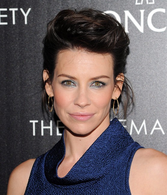 Canadian actor Evangeline Lilly attends a movie screening on Wednesday, Dec. 11, 2013, in New York.