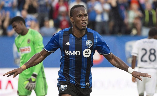 Montreal Impact's Didier Drogba celebrates after scoring against the Philadelphia Union during first half MLS soccer action in Montreal on July 23, 2016.