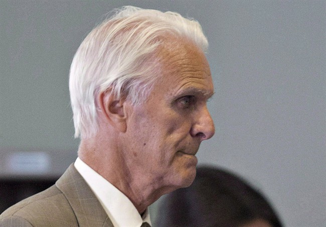 Former Quebec judge Jacques Delisle walks to court in Quebec City on June 14, 2012.