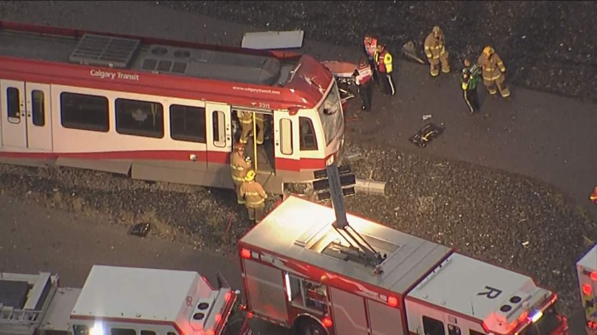 Emergency crews respond to the Tuscany LRT station on Tuesday, Sept. 20, 2016 for a LRT derailment. 