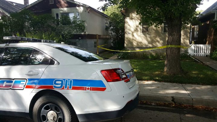 A Regina police car sits outside a downtown home on Montreal Street after Mackenzie Keshane was found dead on Sept. 8.