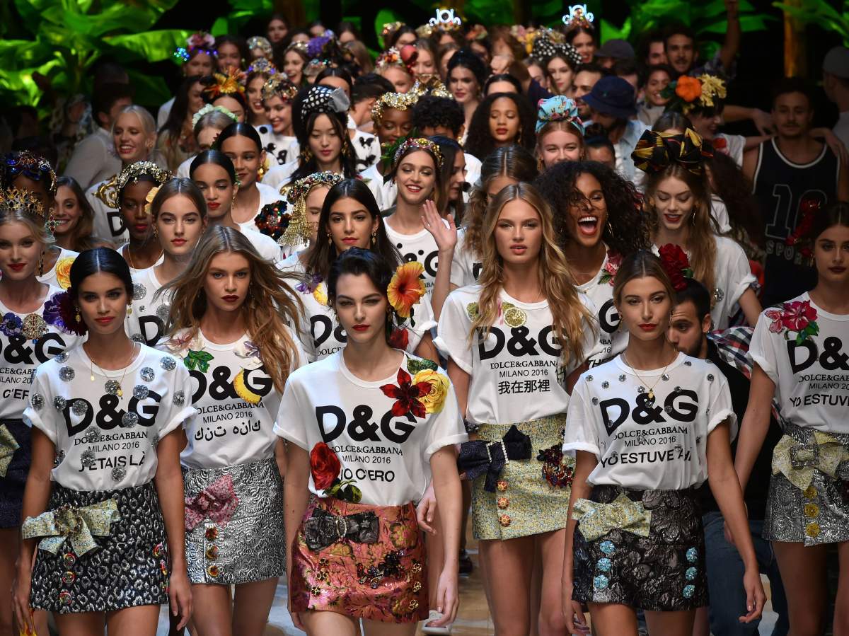 Models closed the spring 2017 Dolce & Gabbana fashion show in branded T-shirts and miniskirts.