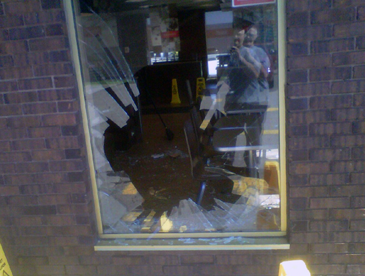 A Tim Hortons window is seen after an injured deer crashed through it on Sept. 19, 2016.  