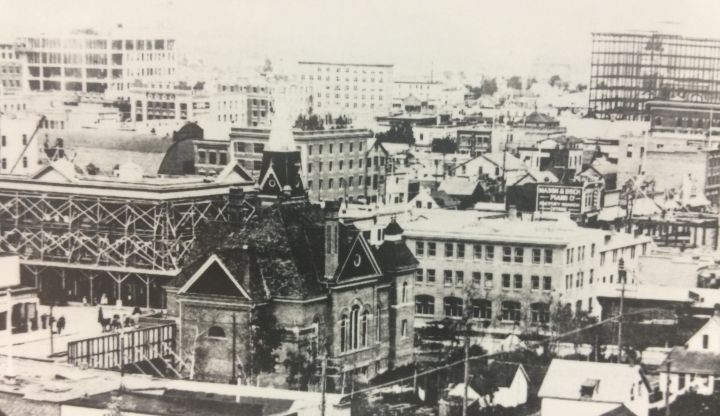 Downtown Edmonton in 1912 looking northeast from 104 Street with the Thistle Rink in view.
