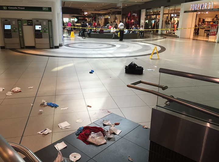 A man has been rushed to hospital after being stabbed multiple times inside the Eaton Centre.