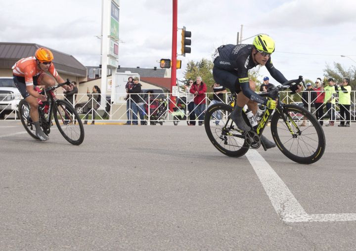 Riders Evan Huffman, left, and Robin Carpenter seen during the 2016 Tour of Alberta in Drayton Valley, Alta.
