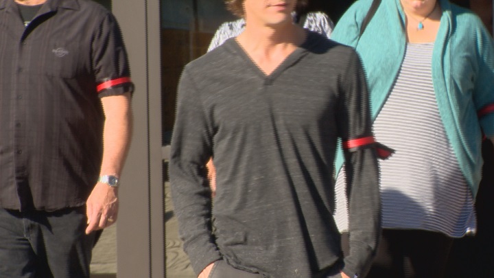 Friends and family of Matt Flitton wear armbands.