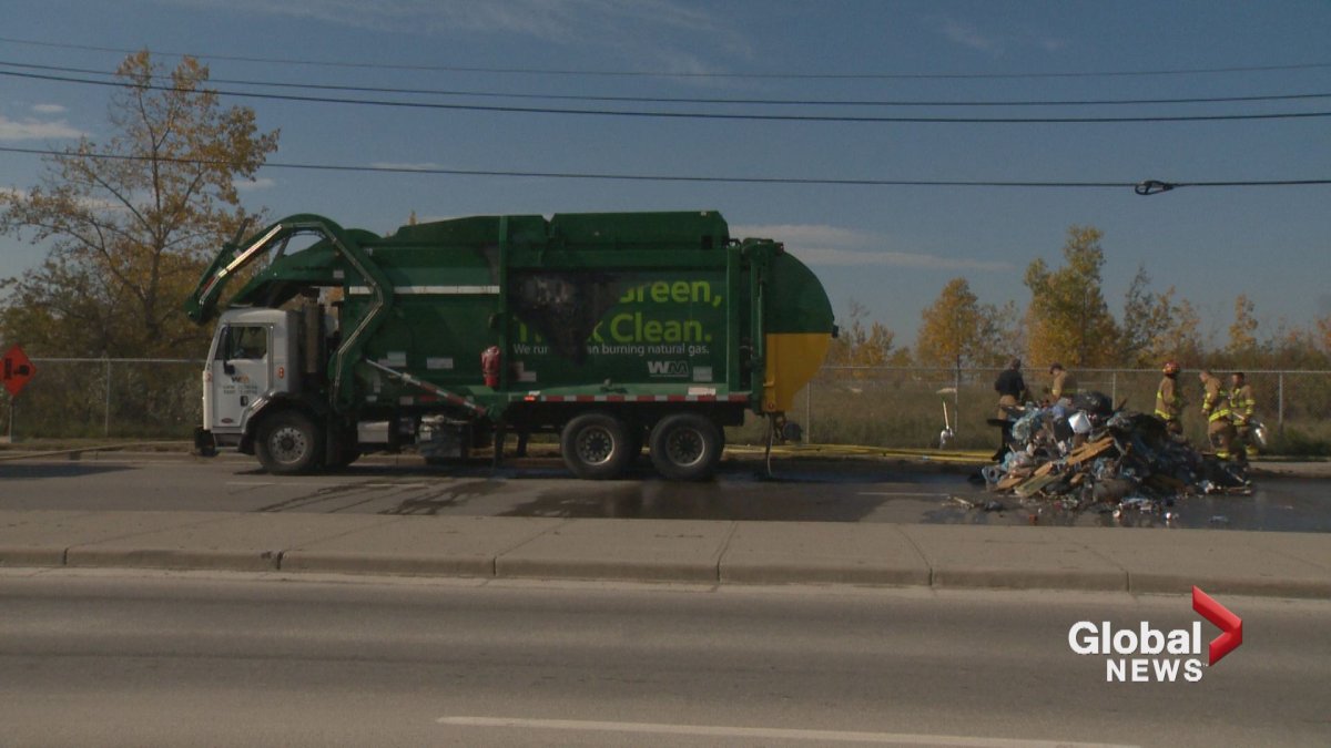A Calgary garbage truck driver was forced to dump the contents of his truck Friday after they caught fire.