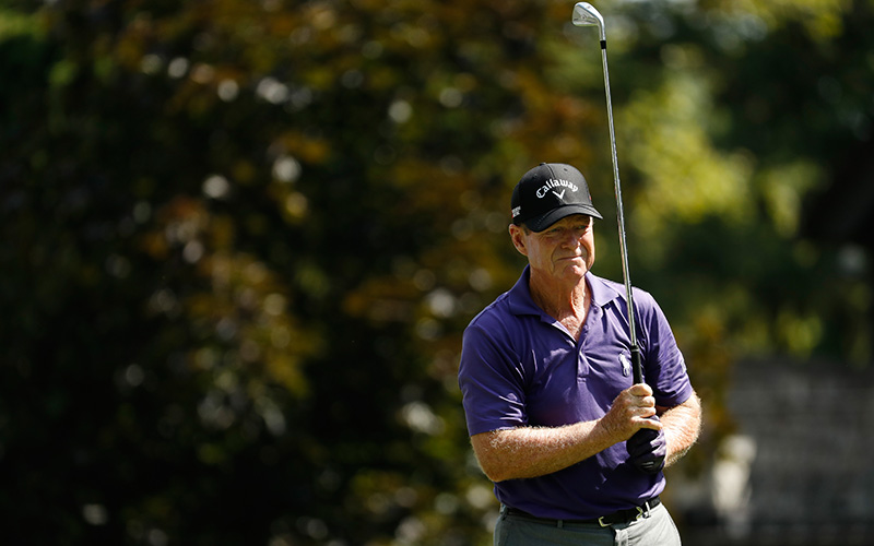 Tom Watson watches his tee shot on the fourth hole during the second round of the 2016 US Senior Open at Scioto Country Club on August 12, 2016 in Columbus, Ohio. 