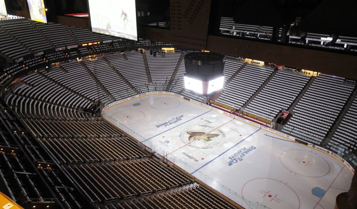 The crowd waves towels and cheers as lasers and spotlights swirl over the  ice at Consol Energy Center before Game 5 of the NHL hockey Stanley Cup  Eastern Conference finals between the